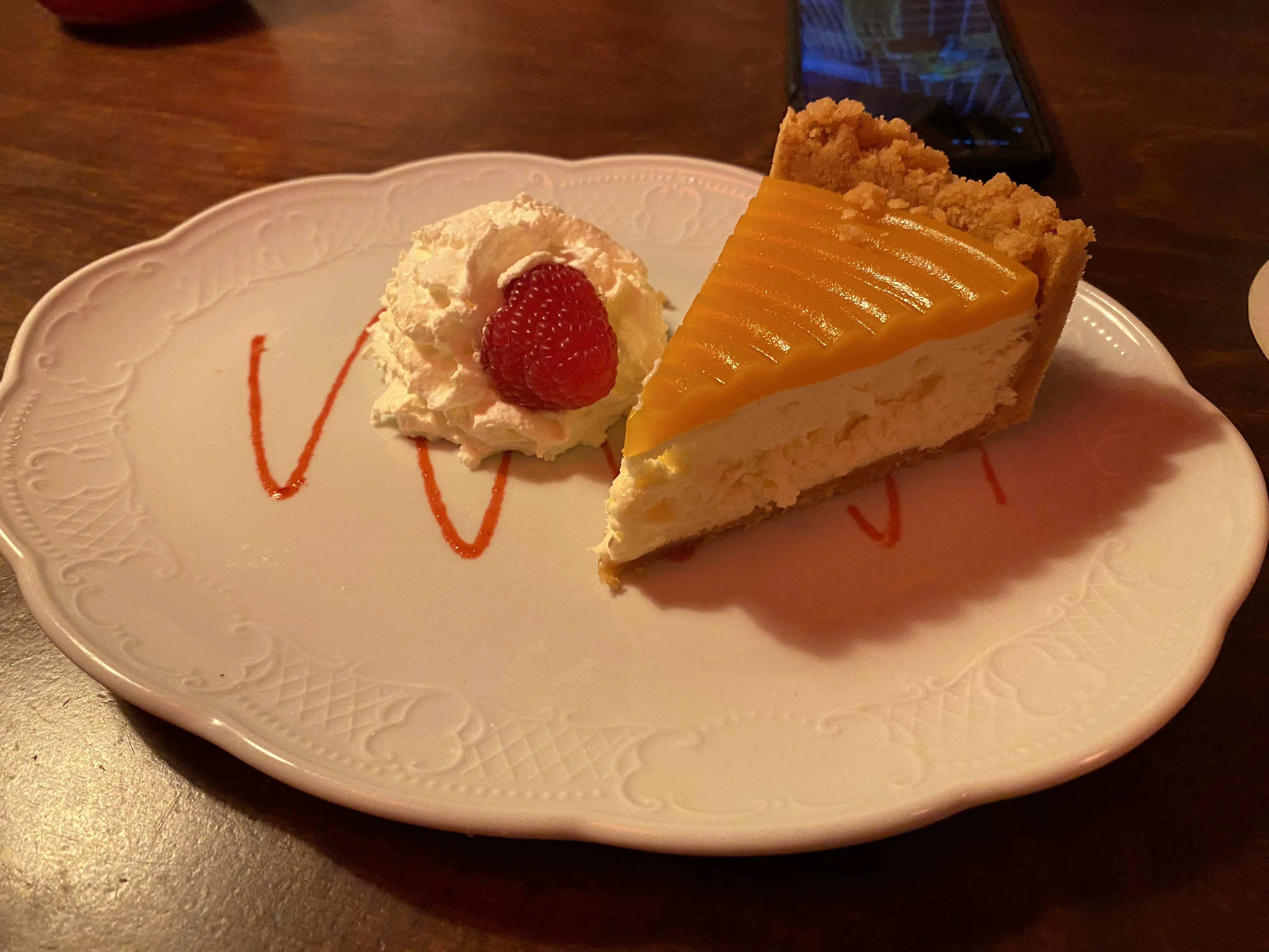 A picture of the food at the restaurant, a cheesecake as dessert